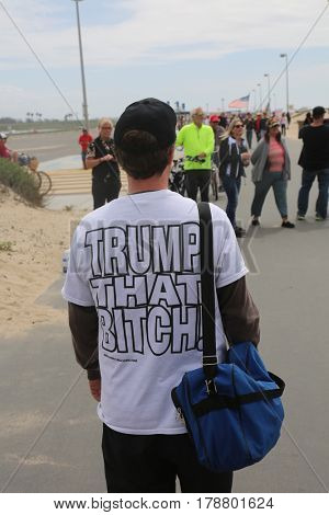Huntington Beach, CA - March 25 2017: Make America Great Again March. Thousand of Supporters of republican president Donald Trump, wear T-Shirts march and wave flags, at a MAGA March. 




