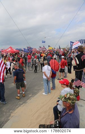 Huntington Beach, CA - March 25 2017: Make America Great Again March. Thousand of Supporters of republican president Donald Trump, march and wave flags, at a MAGA March in Huntington Beach. 




