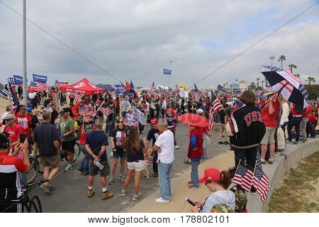Huntington Beach, CA - March 25 2017: Make America Great Again March. Thousand of Supporters of republican president Donald Trump, march and wave flags, at a MAGA March in Huntington Beach. 




