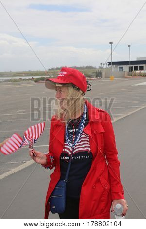 Huntington Beach, CA - March 25 2017: Make America Great Again March. Thousand of Supporters of republican president Donald Trump, wear T-Shirts march and wave flags, at a MAGA March. 




