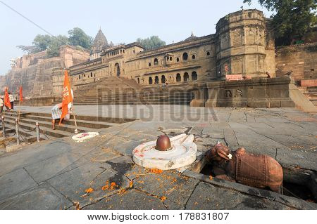 People Walking In Front Of Maheshwar Palace On India