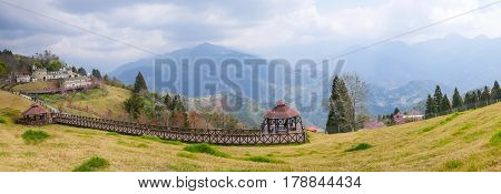 Panorama of mountain landscape at Cingjing Farm Taichung city Taiwan under white cloud