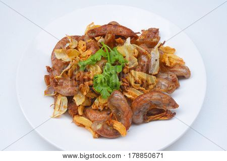Pork chitterlings, fried garlic, pepper on the plate