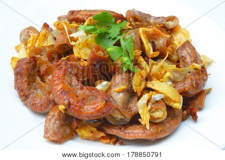 Pork chitterlings, fried garlic, pepper on the plate