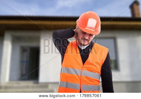Picture Of Young Male Engineer Having Neck Problems