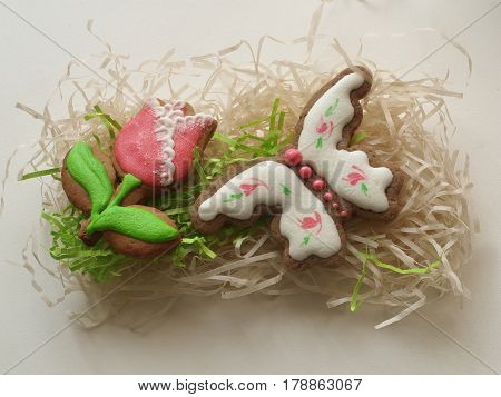 Delicious Easter cookies cake as the tulip and butterly with sugar icing