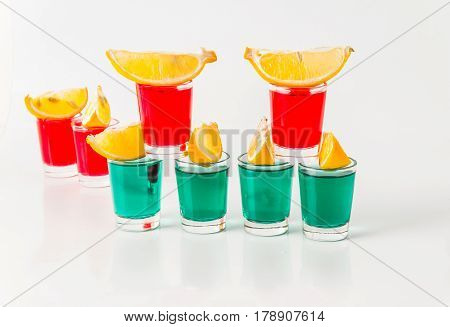 Glasses With Green And Red Kamikaze, Glamorous Drinks, Mixed Drink Poured Into Shot Glasses