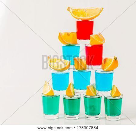 Glasses With Blue, Green And Red Kamikaze, Glamorous Drinks, Mixed Drink Poured Into Shot Glasses