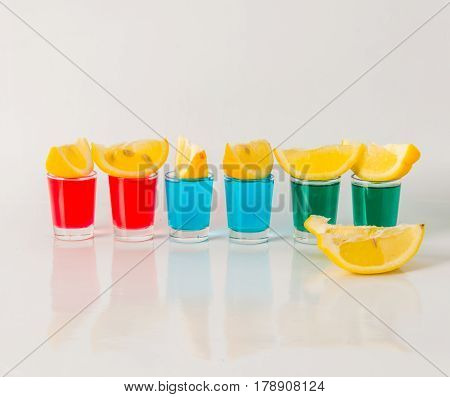 Glasses With Blue, Green And Red Kamikaze, Glamorous Drinks, Mixed Drink Poured Into Shot Glasses