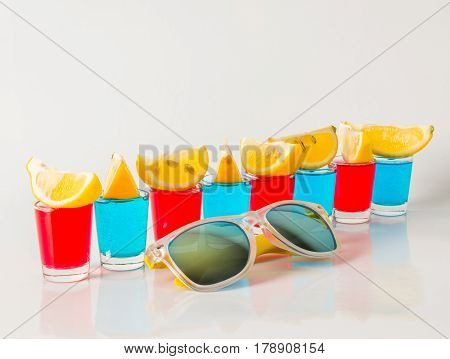 Glasses With Blue, Green And Red Kamikaze, Glamorous Drinks, Mixed Drink Poured Into Shot Glasses, S