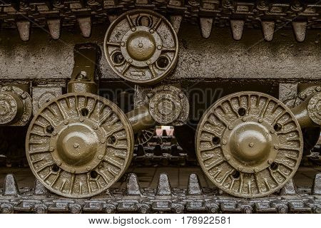 Tracked chassis Soviet heavy tank during the second world war. Tracked chassis with wheels closeup. Artillery WWII.