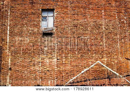 crack brick wall texture background on day noon light with broken window for interior or exterior brick wall building decoration texture background.