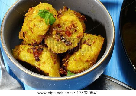 Dry Gatte ki sabji or Dhoka made of chickpea flour or Besan with onions and ginger and other Indian spices.