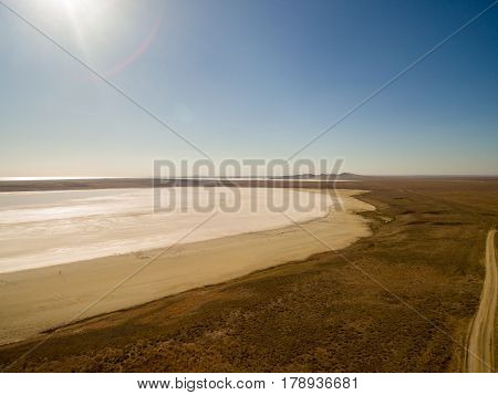Aerial shot of Koyashskoe pink salt lake firth in Crimea