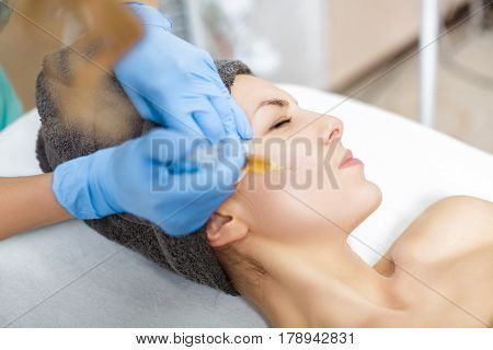 procedure Plasmolifting injection. plasma injection into the skin of the cheeks of the patient
