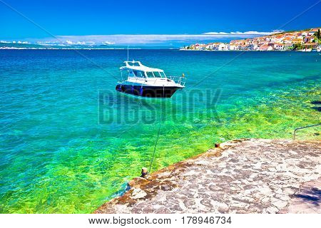 Kali Beach And Boat On Turquoise Sea