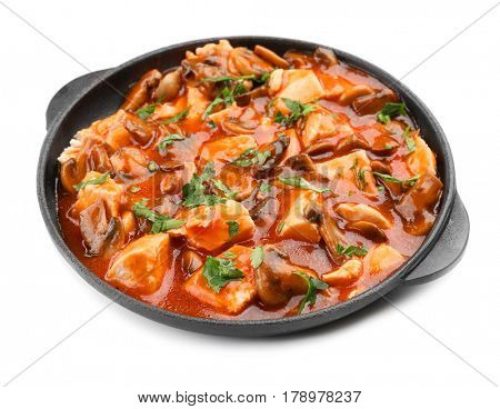 Chicken cacciatore in frying pan isolated on white