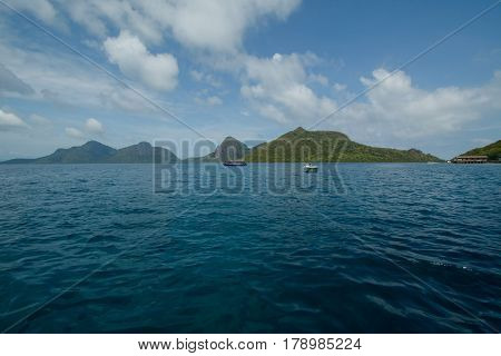 Beautiful tropical Bohey Dulang island with beach and blue water for relax