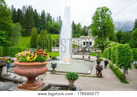 Linderhof Palace. Fountain Group Flora And Puttos. Focus On Flowers.