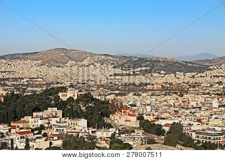 View From Acropolis Hill Of The City Of Athens, The National Observatory And St Marina Church On Nym