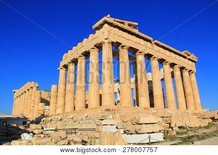 The Parthenon on the Acropolis in Athens, Greece with a beautiful blue sky copy space and no people.