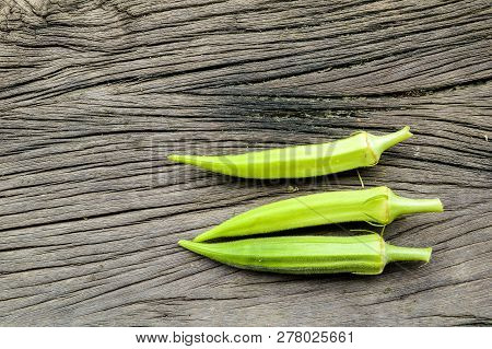 Fresh Green Okra On Wooden Floor Abelmoschus Esculentus