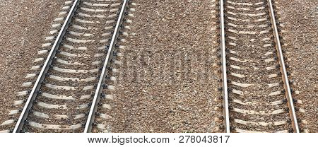 Railway On Gravel Background At Dry Sunny Summer Day