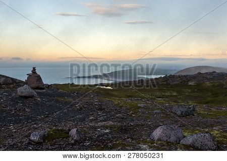 Coastline Of Barents Sea On The Sunset. Arctic Ocean, Kola Peninsula, Russia