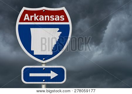 Road Trip To Arkansas, Red, White And Blue Interstate Highway Road Sign With Word Arkansas And Map O