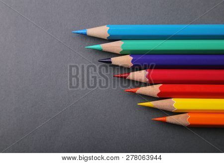 Set Of Colored Pencils. Gray Background. Seven.