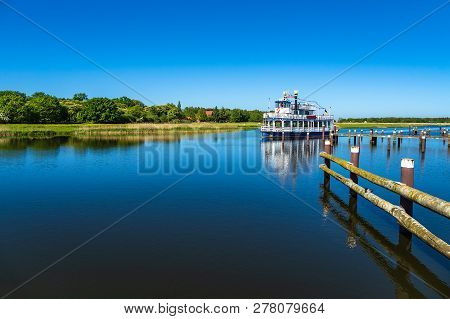 Landscape With Pleasure Boat In Prerow, Germany.