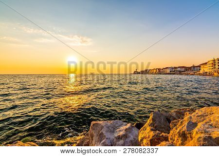 Sunset Above The Adriatic Sea In Piran City, Slovenia. Old Ancient And Mediaveal City, View From Coa