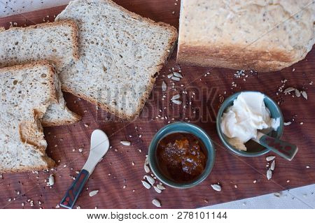 A Tasty And Healthy Breakfast In A Wooden Table Over A White Background