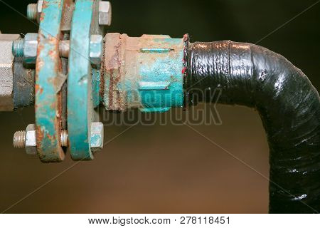 Drinking Water Supply System. Old Pipeline. A Composite Repair, An Example Of Bending, Pipe Bend. Pi