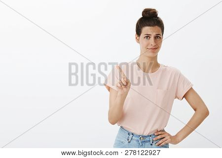 Displeased Girl Waving Index Finger In No And Prohibition Gesture Making Awkward Intense Smile Holdi