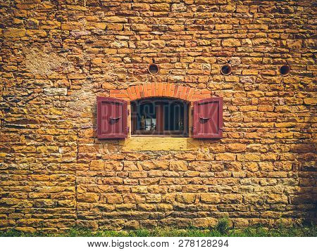 July 19, 2017. Village Ameugny France Burgundy Region In Summer. Old Stone Facade Of The Apartment B