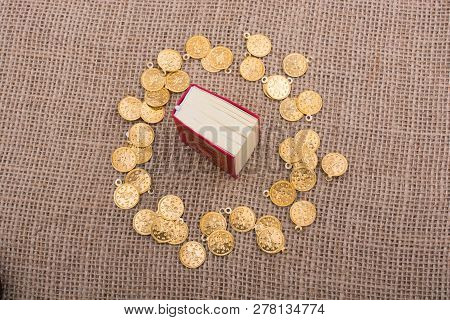 The Holy Quran In The Middle Of Fake Coins Circle