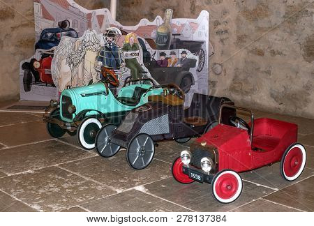 Narva, Estonia - November 17, 2018: Old Pedal Cars For Children. Rare Pre-war Toys. Exhibition In Na