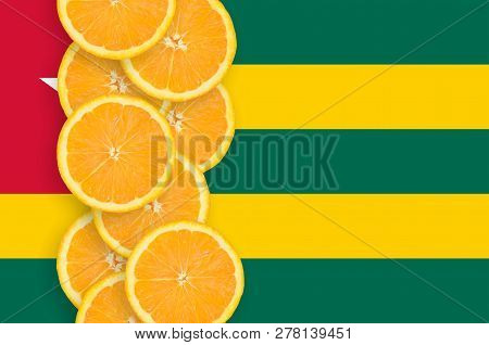 Togo Flag And Citrus Fruit Slices Vertical Row