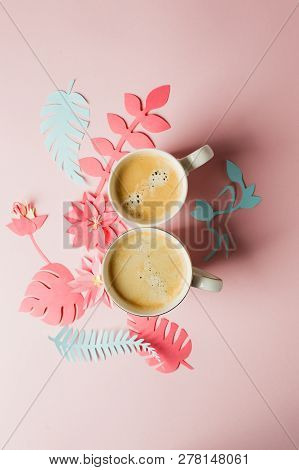 View From Above With Two Cups Of Coffee And Modern Origami Handcraft Paper Flowers Copy Space. Woman