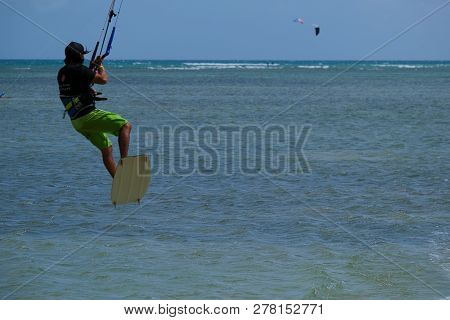 Mui Ne, Vietnam - 11 2018: Kitesurfing, Kiteboarding, Kite Surf. Extreme Sport Kitesurfing In Tropic