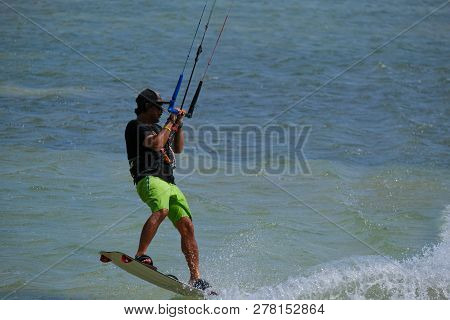 Mui Ne, Vietnam - 11 2018: Kitesurfing, Kiteboarding, Kite Surf. Extreme Sport Kitesurfing In Tropic