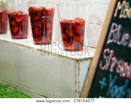 Strawberry And Syrup In The Plastic Glass Show On The Shelf Prepare For Made To Smoothies By The Cus