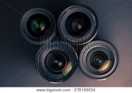 Set Of Various Dslr Lenses With Colorful Reflections