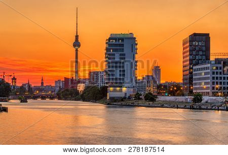 Dramatic Sunset At The River Spree In Berlin With The Famous Television Tower In The Back