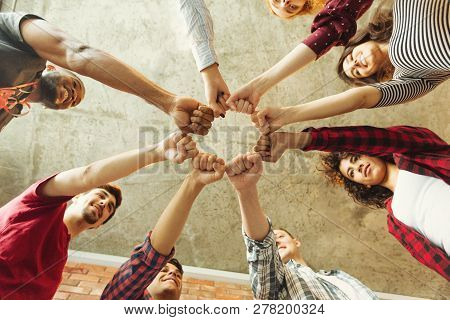 Group Of People Making Fist Bump. People Solidaruty Concept