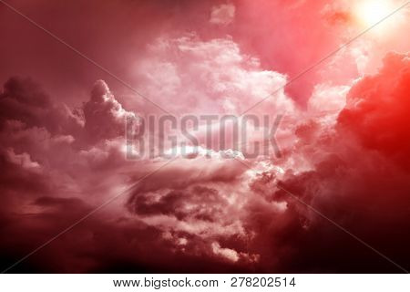 Sunlight In The Red Dramatic Clouds Area