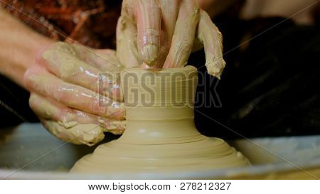 Professional Male Potter Making Mug In Pottery Workshop, Studio. Handmade, Art And Handicraft Concep
