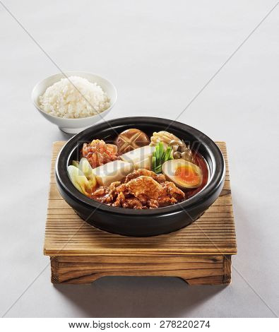 Japanese Pork With Rice Set Meal In A Wood Dish