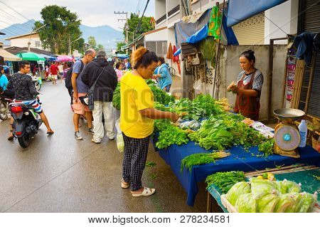 Pai, Thailand - January 10, 2017: People Buing Fresh Grocery At Asian Market At Pai City Street